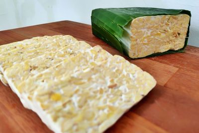 High angle view of bread on cutting board