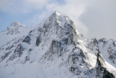 Snow covered mountain against sky