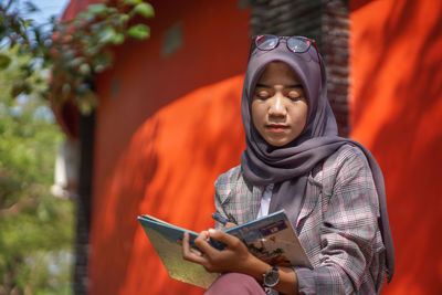 Young woman using mobile phone