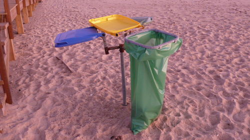 High angle view of bottle on beach