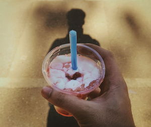 Close-up of person holding ice cream