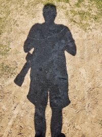 Shadow of man on ground