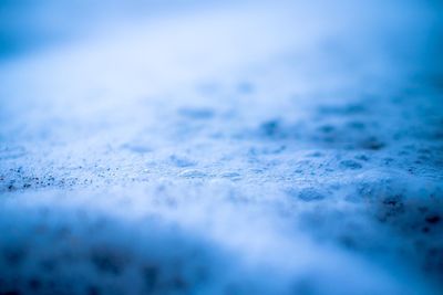 Surface level of landscape against blue sky