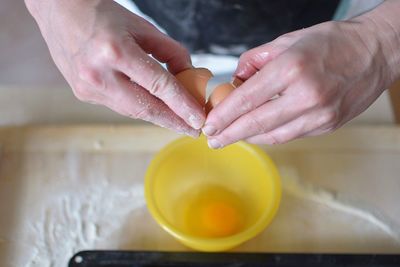 Midsection of man preparing food