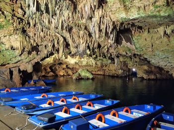 Panoramic view of boats moored in lake