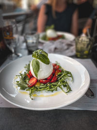 Close-up of fruit salad in plate on table