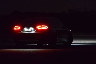 Cars on road at night