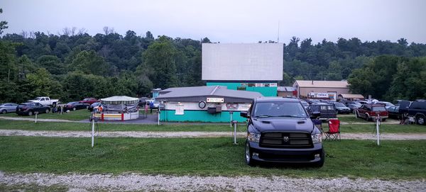 Cars on grassy field