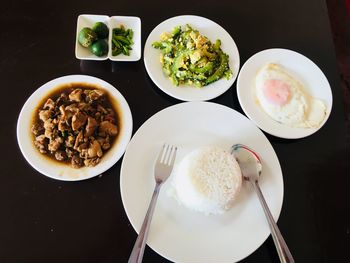 High angle view of breakfast served on table