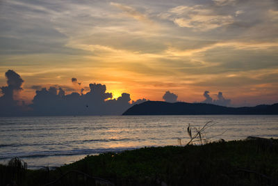 Scenic view of sea against sky during sunset