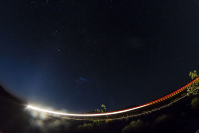 Scenic view of star field against sky at night