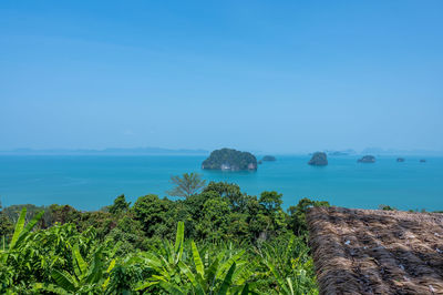 Scenic view of sea against clear blue sky