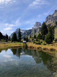 Scenic camping site with view of lake and mountains