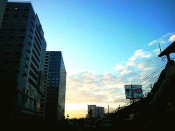 Low angle view of modern building against sky