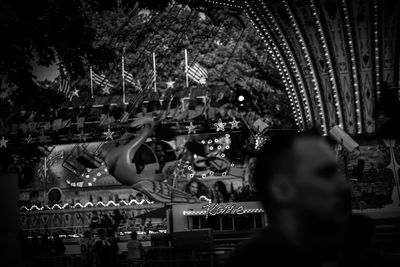 High angle view of illuminated carousel in amusement park