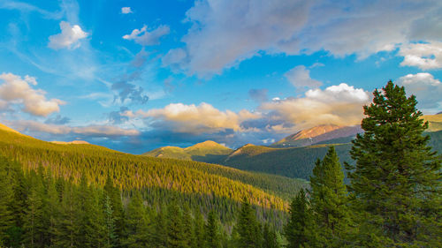 Scenic view of mountains against sky at sunset