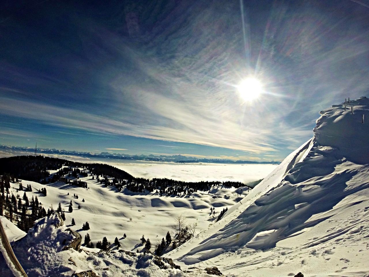 sun, snow, winter, tranquil scene, cold temperature, tranquility, scenics, beauty in nature, mountain, sunbeam, sunlight, sky, nature, mountain range, water, lens flare, landscape, season, idyllic, weather