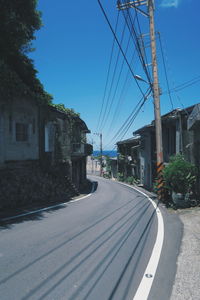 Narrow street along buildings