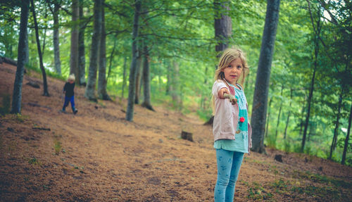 Girl walking in forest