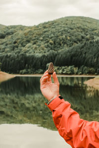 Close-up of hand holding a lake