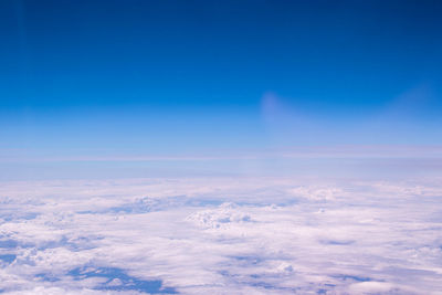 Aerial view of clouds over blue sky