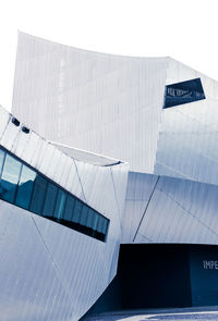 Low angle view of modern building against clear sky