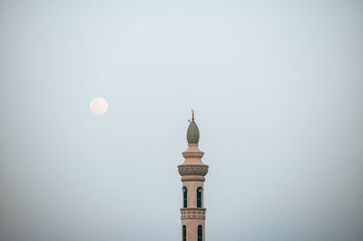 Low angle view of lighthouse against clear sky