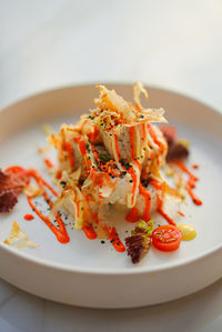 Close-up of food in plate on table