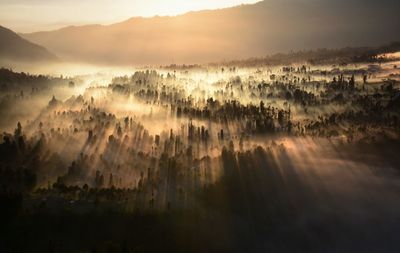 Panoramic view of landscape against sky during sunset