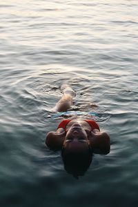 Man swimming in pool