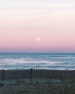 View of calm sea at sunset