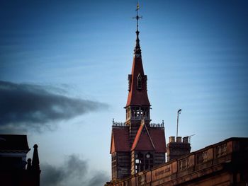 Low angle view of church against blue sky