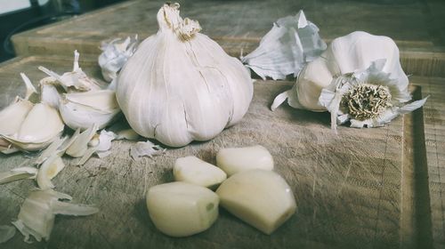 Close-up of garlic on table