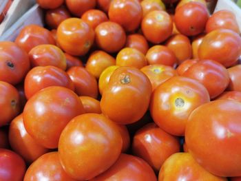 Full frame shot of oranges at market stall