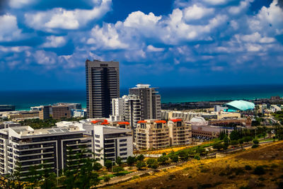 Buildings in city against sky