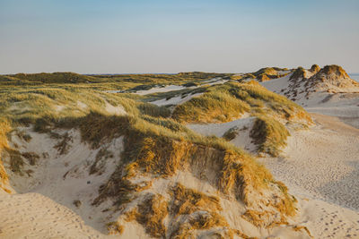 Scenic view of desert against sky