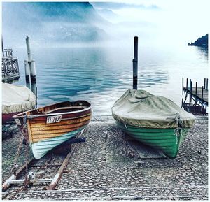 Boats moored in sea