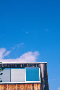 Low angle view of built structure against blue sky