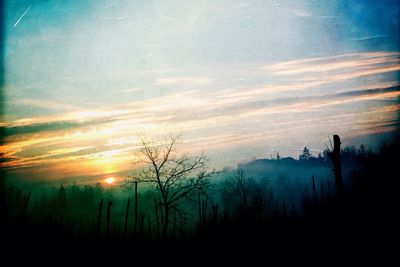 Scenic view of landscape at sunset