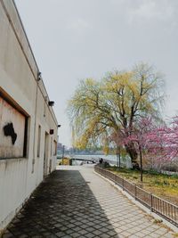 Street amidst buildings against sky