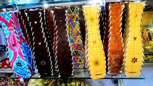 Multi colored candies for sale at market stall