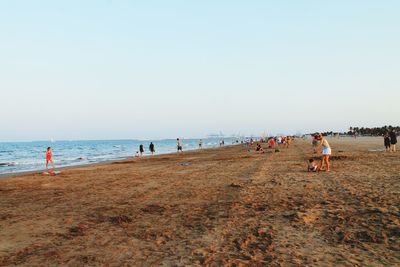 People enjoying at beach