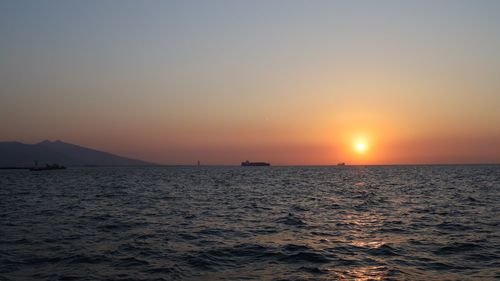 Scenic view of sea against sky during sunset