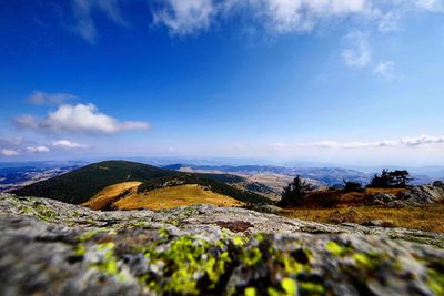 Scenic view of landscape against blue sky