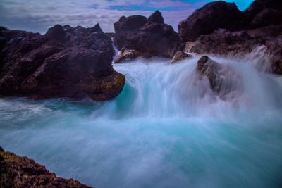 Scenic view of waterfall