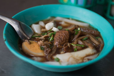 Close-up of noodles in bowl on table