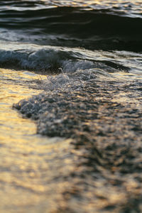 Close-up of wave on beach