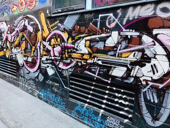 High angle view of graffiti on metallic structure