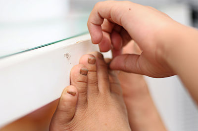 Close-up of person holding hands