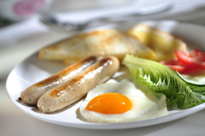 Close-up of breakfast served on table